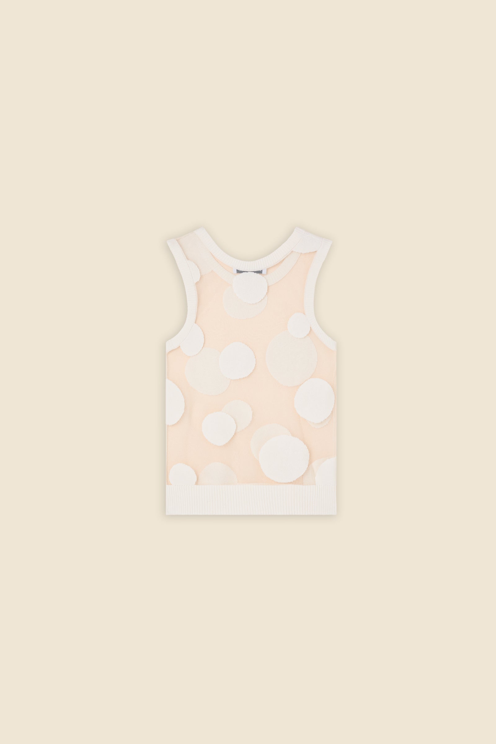 The classic pattern of the top is given a modern twist with intricate polka dot hole design on knit jacquard
