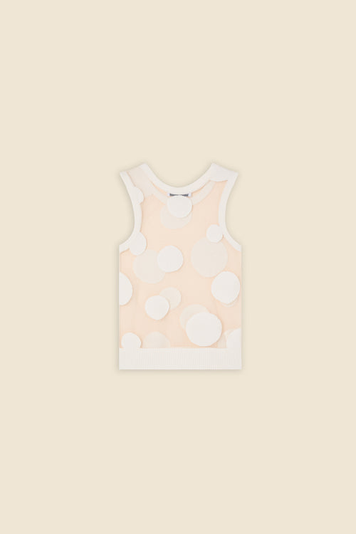 The classic pattern of the top is given a modern twist with intricate polka dot hole design on knit jacquard
