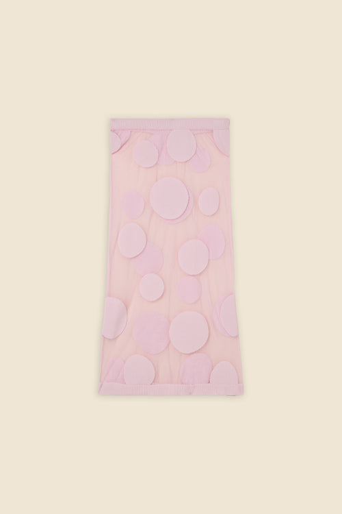 The classic pattern of the skirt is given a modern twist with intricate polka dot hole design on knit jacquard