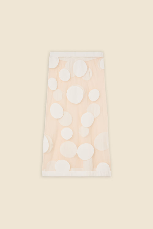 The classic pattern of the skirt is given a modern twist with intricate polka dot hole design on knit jacquard