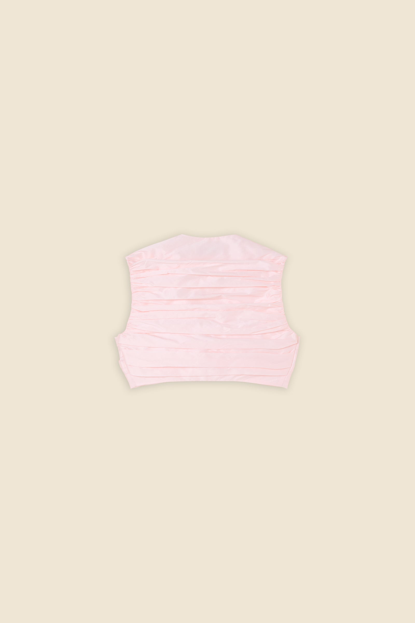 The meticulously placed pleats and silk-blend taffeta define the elegance of the top, reflecting classic haute couture craftsmanship with a modern edge