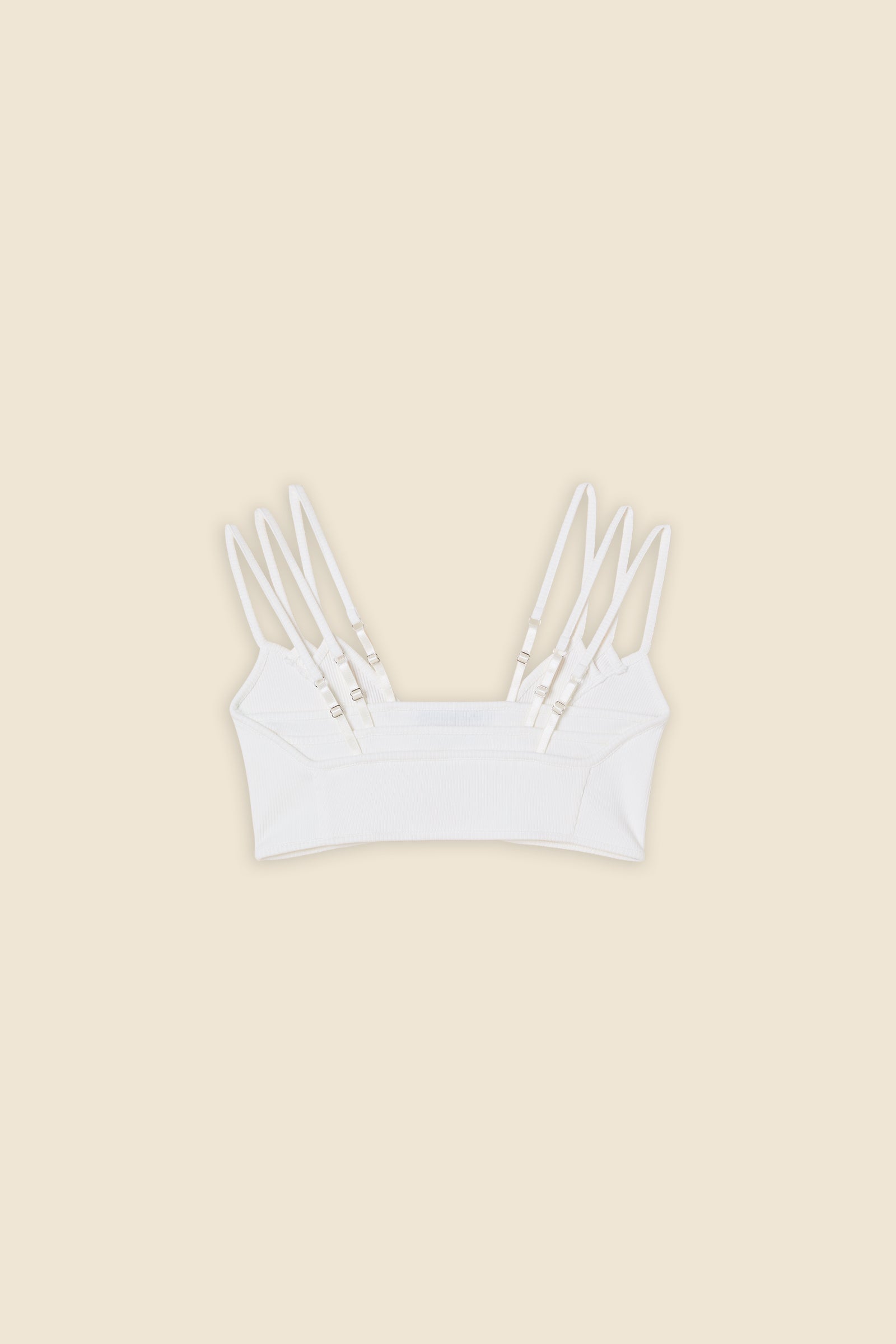 The bralette is a classic staple with a viktor&rolf signature layering twist, inspired by the ‘embodiment' haute couture collection