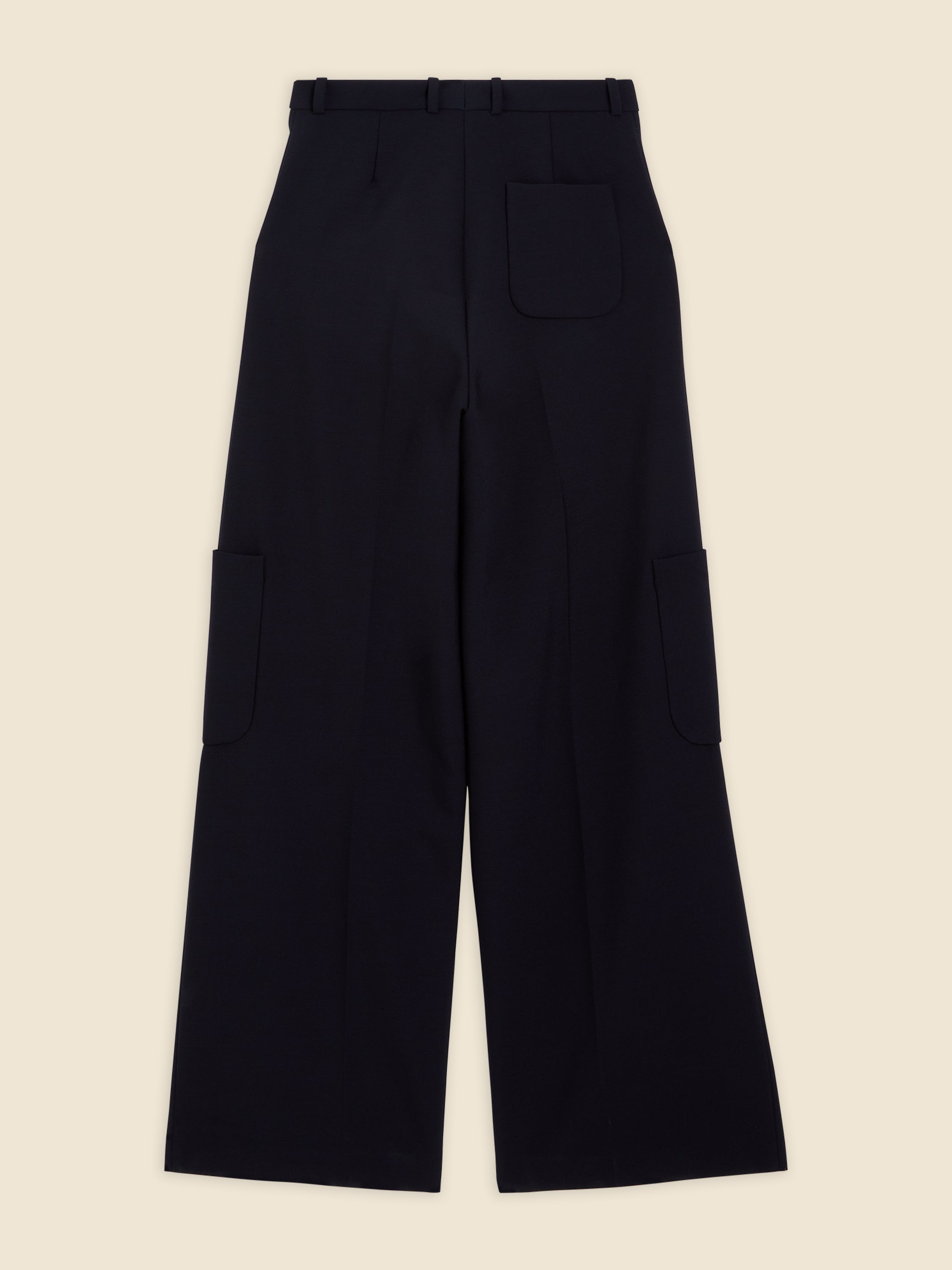 Wide-leg black trousers featuring belt loops and multiple pockets, tailored in a flowing fabric for a contemporary silhouette.
