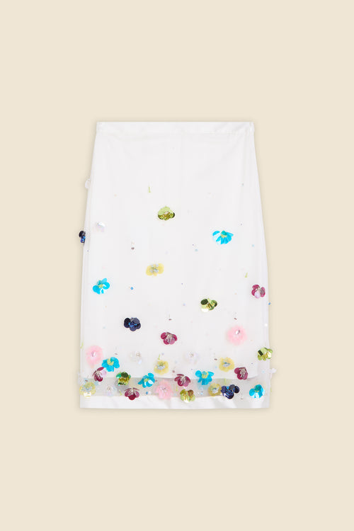 With hand-applied paillettes and crystals on silk organza featuring the satin edges, the skirt transforms classic floral embroidery into a modern piece