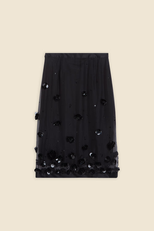 With hand-applied paillettes and crystals on silk organza featuring the satin edges, the skirt transforms classic floral embroidery into a modern piece