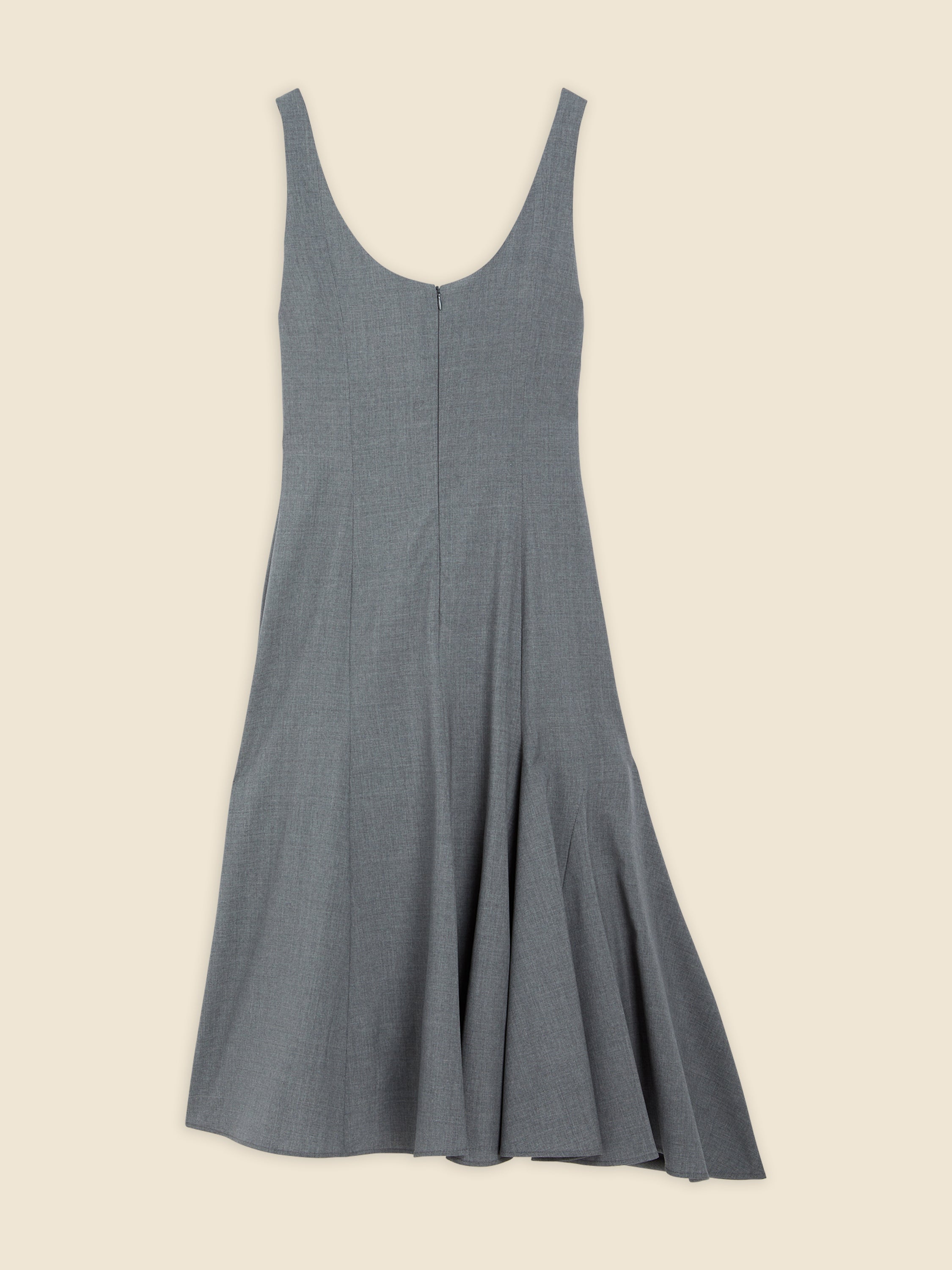Gray sleeveless dress with elegant pleated hem, featuring a subtle texture and classic zip closure on a neutral background.