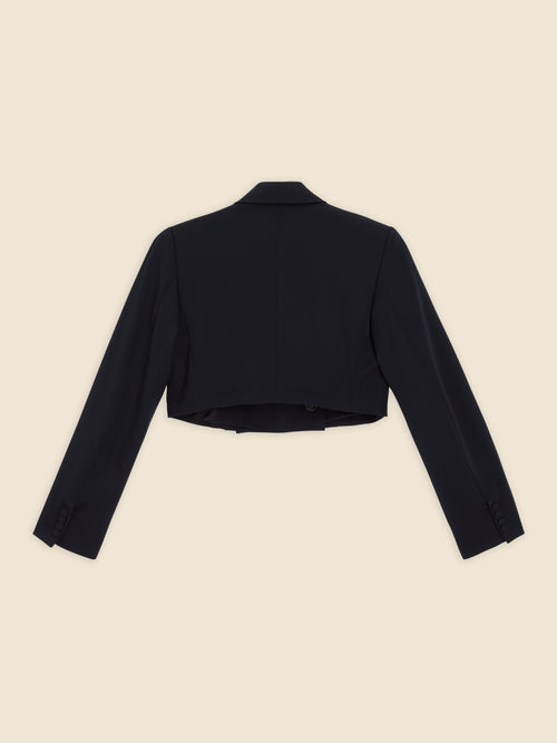Elegant black wool cropped blazer with tailored long sleeves and button accents on cuffs, designed for a sleek, modern silhouette.