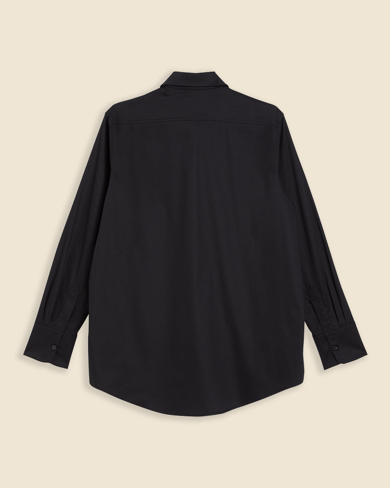 Sophisticated black cotton long-sleeve shirt with buttoned cuffs and a classic collar in a minimalist design.