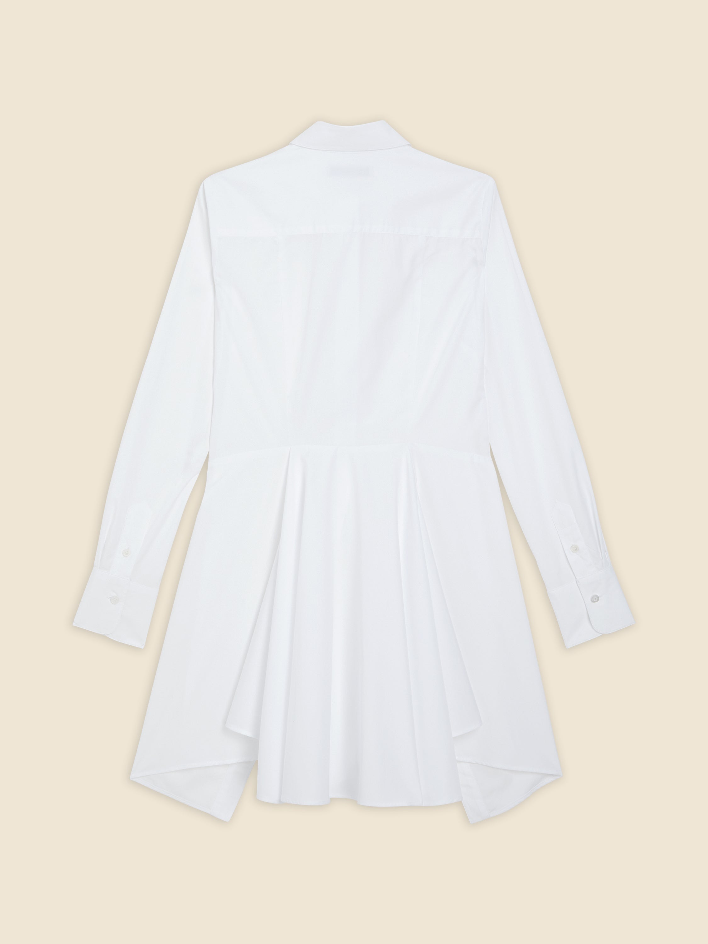 Back view of a flowy white cotton shirt dress featuring long sleeves, classic collar, and elegant pleats enhancing its design.