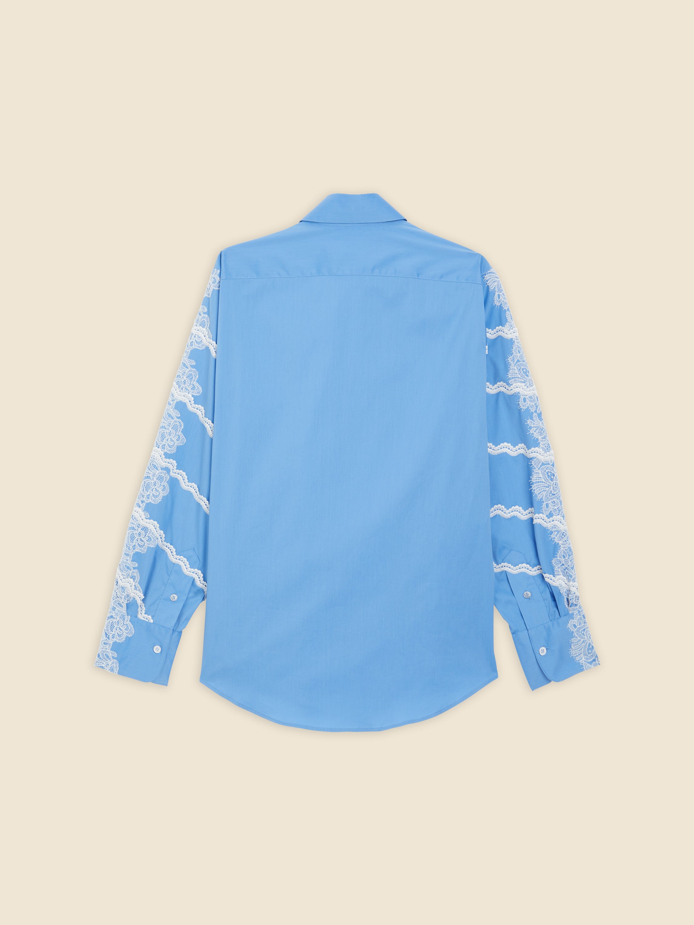 Light blue shirt with white lace floral embroidery on sleeves, featuring a classic collar and buttoned cuffs against a plain background.