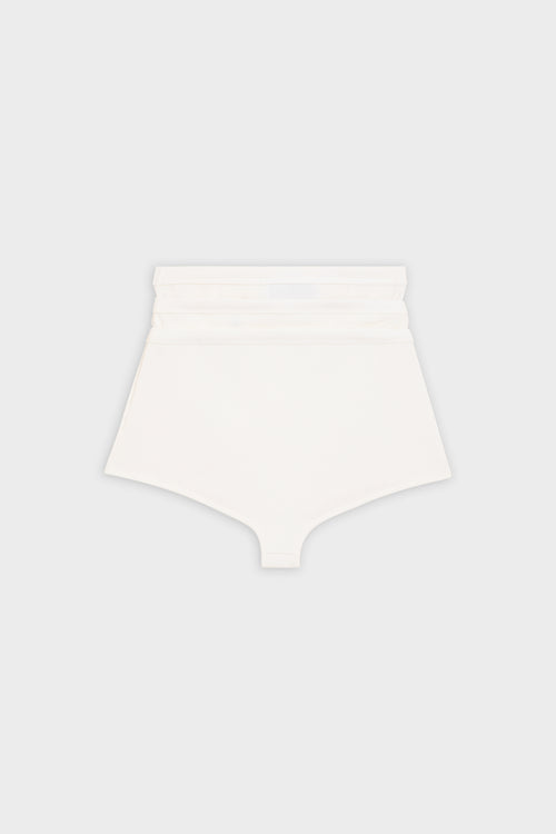 Triple layer white shorts on a white background.