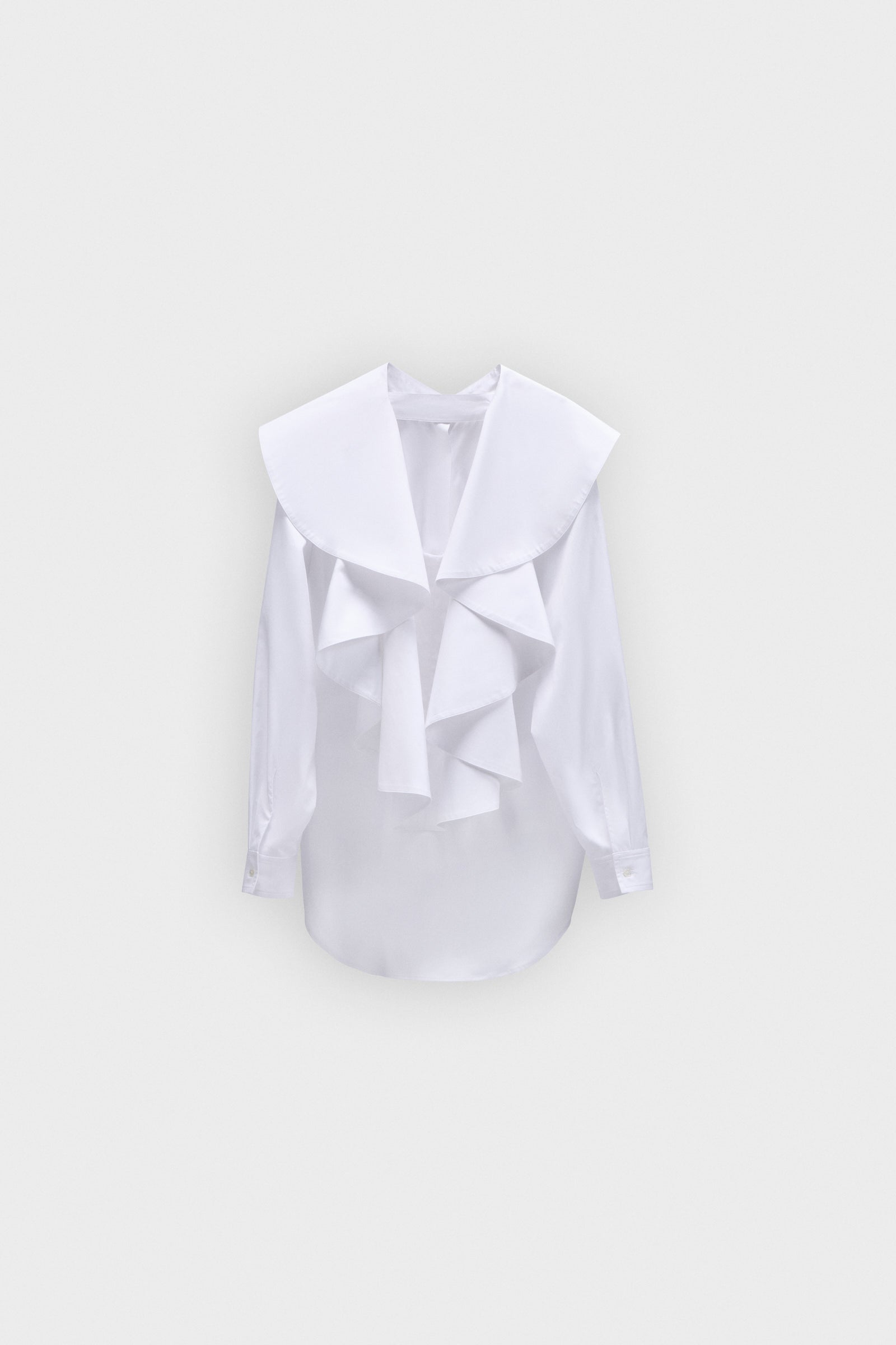 BLOUSE MET VOLANTDETAIL