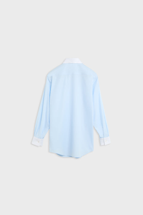A light blue long-sleeve button-up shirt shown from the back, featuring a white collar and white cuffs, displayed against a light gray background.