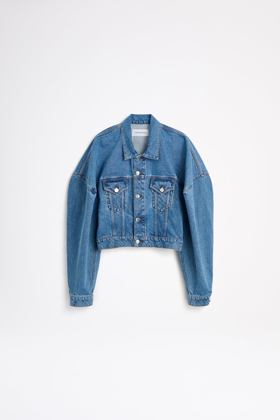 Blue denim jacket on a white background