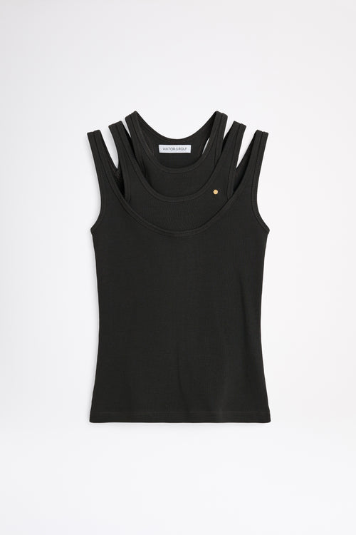 Black tank top with thin straps on a white background