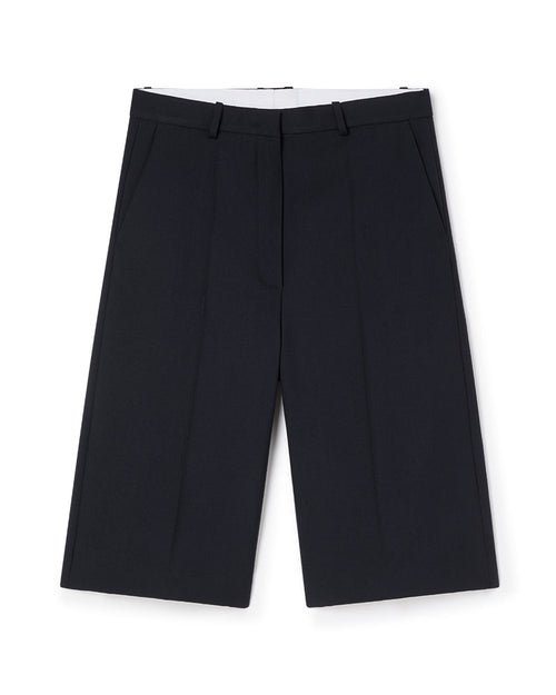 Black tailored wide-leg shorts featuring crisp creases and a smooth waistband, ideal for a sophisticated, minimalist look.