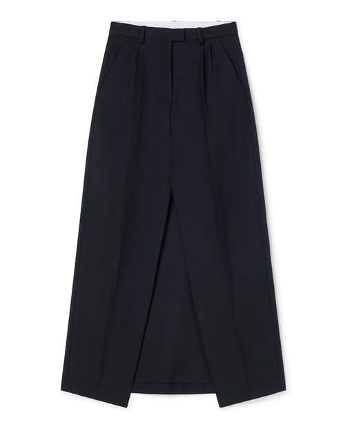 Elegant tailored black culottes featuring a discreet front pleat and subtle belt loops, crafted from soft wool-blend fabric.