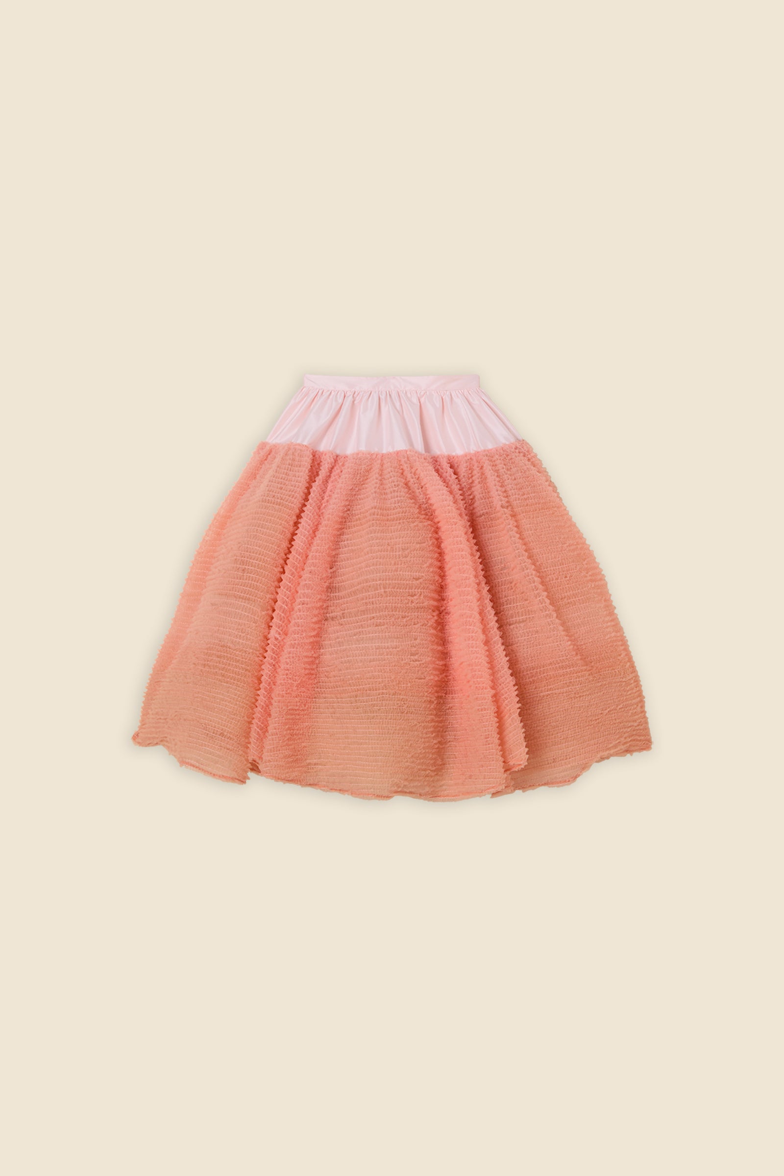 Inspired by the tulle from the ‘late stage capitalism waltz’ haute couture collection, the skirt features hand crafted tulle ruffles for a feminine texture
