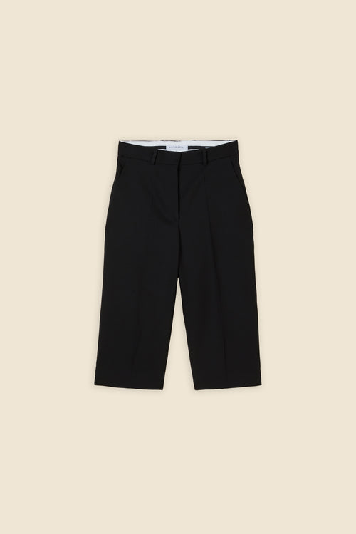 Crafted from wool, the high-waisted capri pant offers a tailored fit and timeless elegance