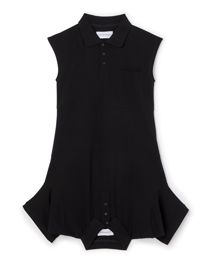 Sleeveless black cotton romper with a classic polo collar and button-down front, featuring a minimalist design and flared hem.