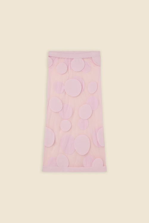 The classic pattern of the skirt is given a modern twist with intricate polka dot hole design on knit jacquard