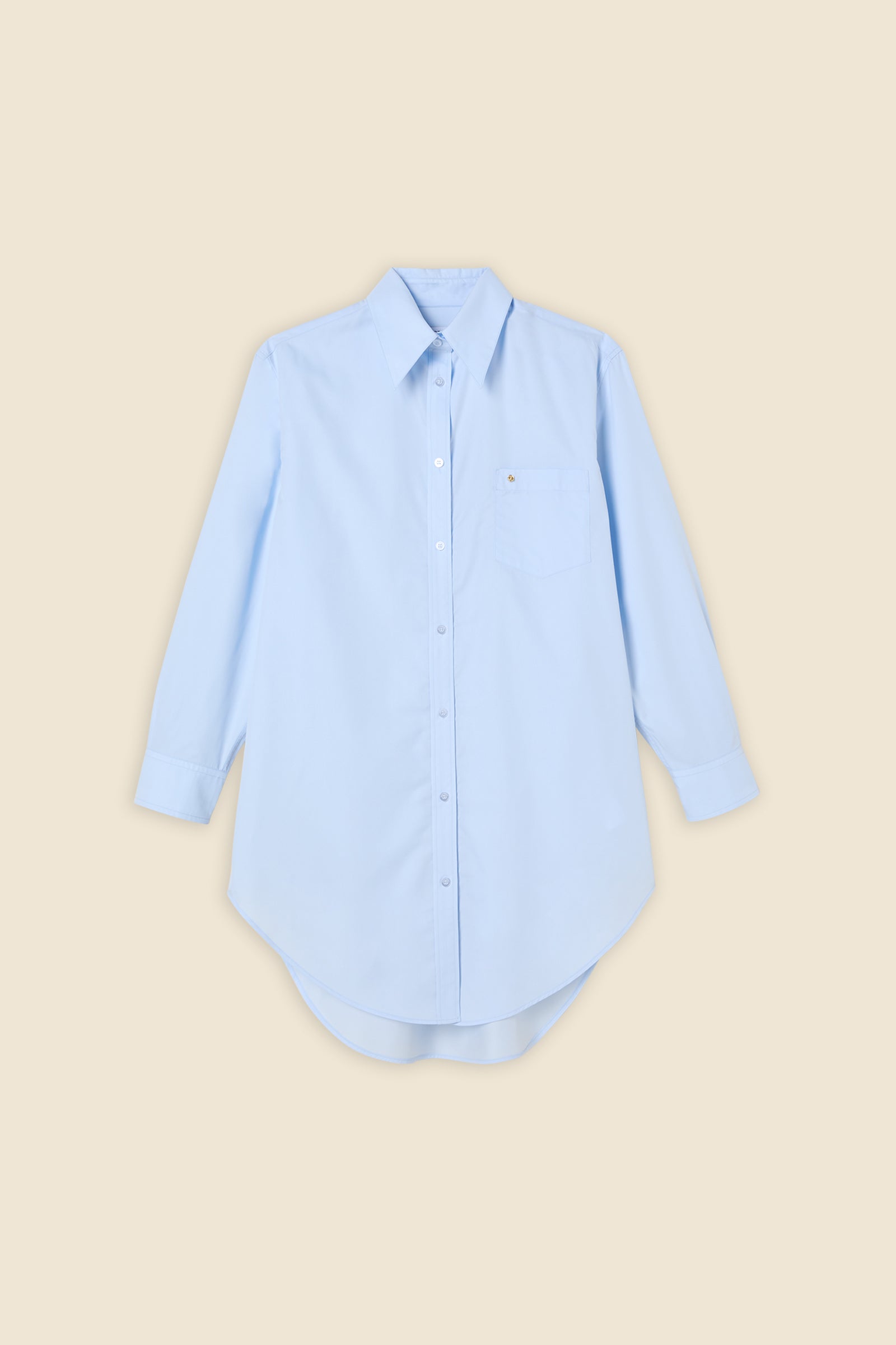 Crafted from poplin, the oversized shirt offers a tailored fit and timeless elegance