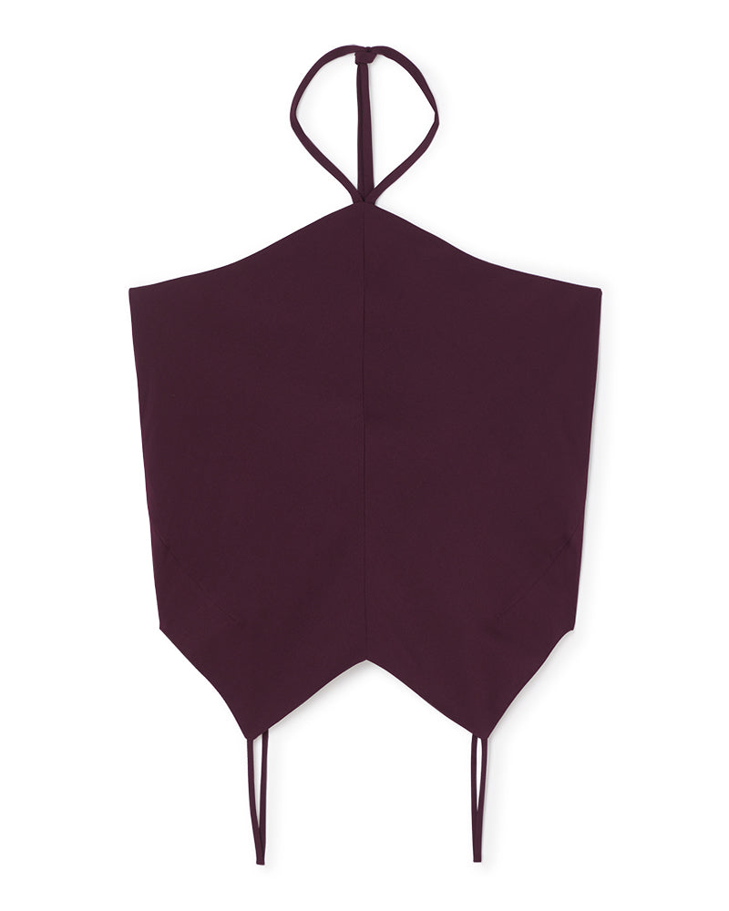 Elegant burgundy halter top showcases a sleek, angular design with delicate tie straps for a sophisticated look.