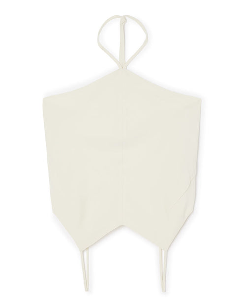 Ivory halter top with sleek lines and minimalist design, featuring thin straps and a pointed hem for a modern look.