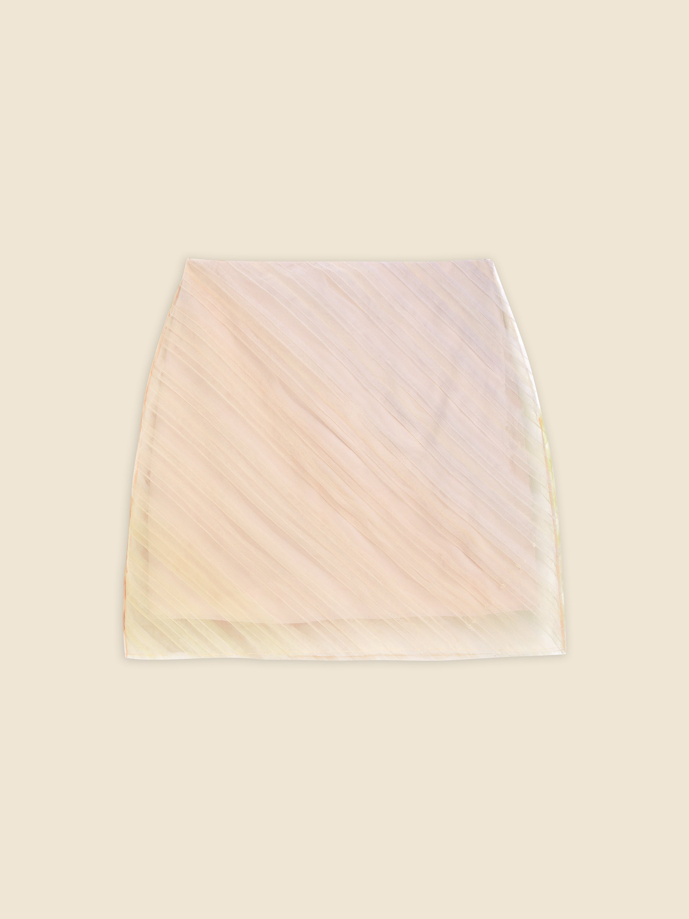 Elegant beige organza mini skirt with diagonal pleats, featuring a subtle translucent texture on a neutral background.