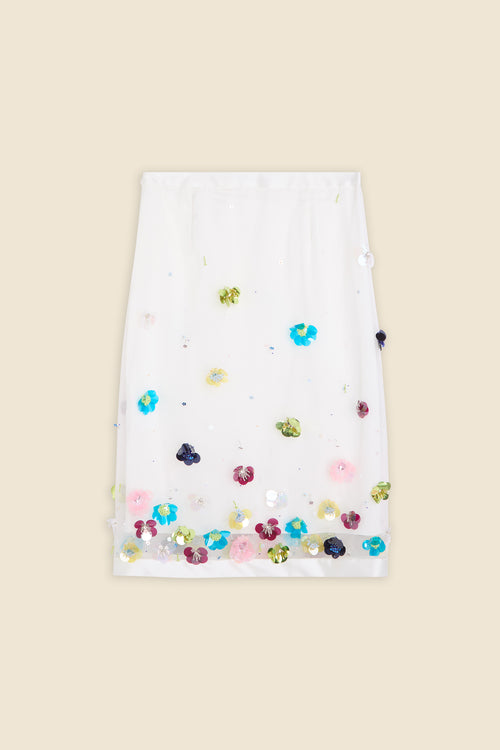 With hand-applied paillettes and crystals on silk organza featuring the satin edges, the skirt transforms classic floral embroidery into a modern piece