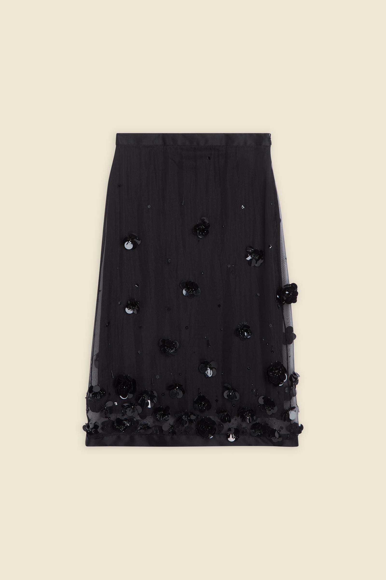 With hand-applied paillettes and crystals on silk organza featuring the satin edges, the skirt transforms classic floral embroidery into a modern piece