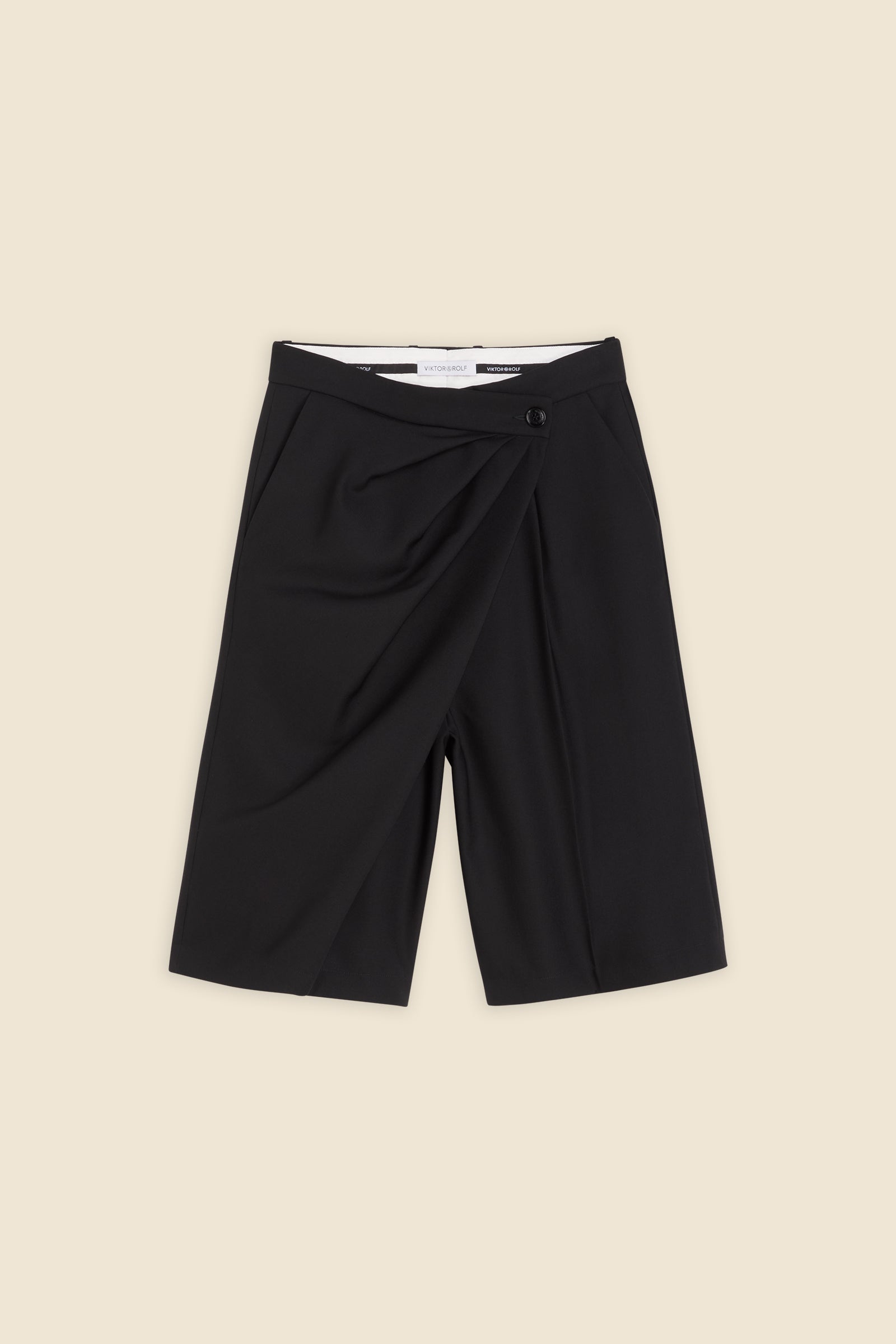 Drawing from viktor&rolf’s haute couture ‘red carpet’ collection, the trouser transforms traditional menswear patterns into a feminine, glamorous silhouette