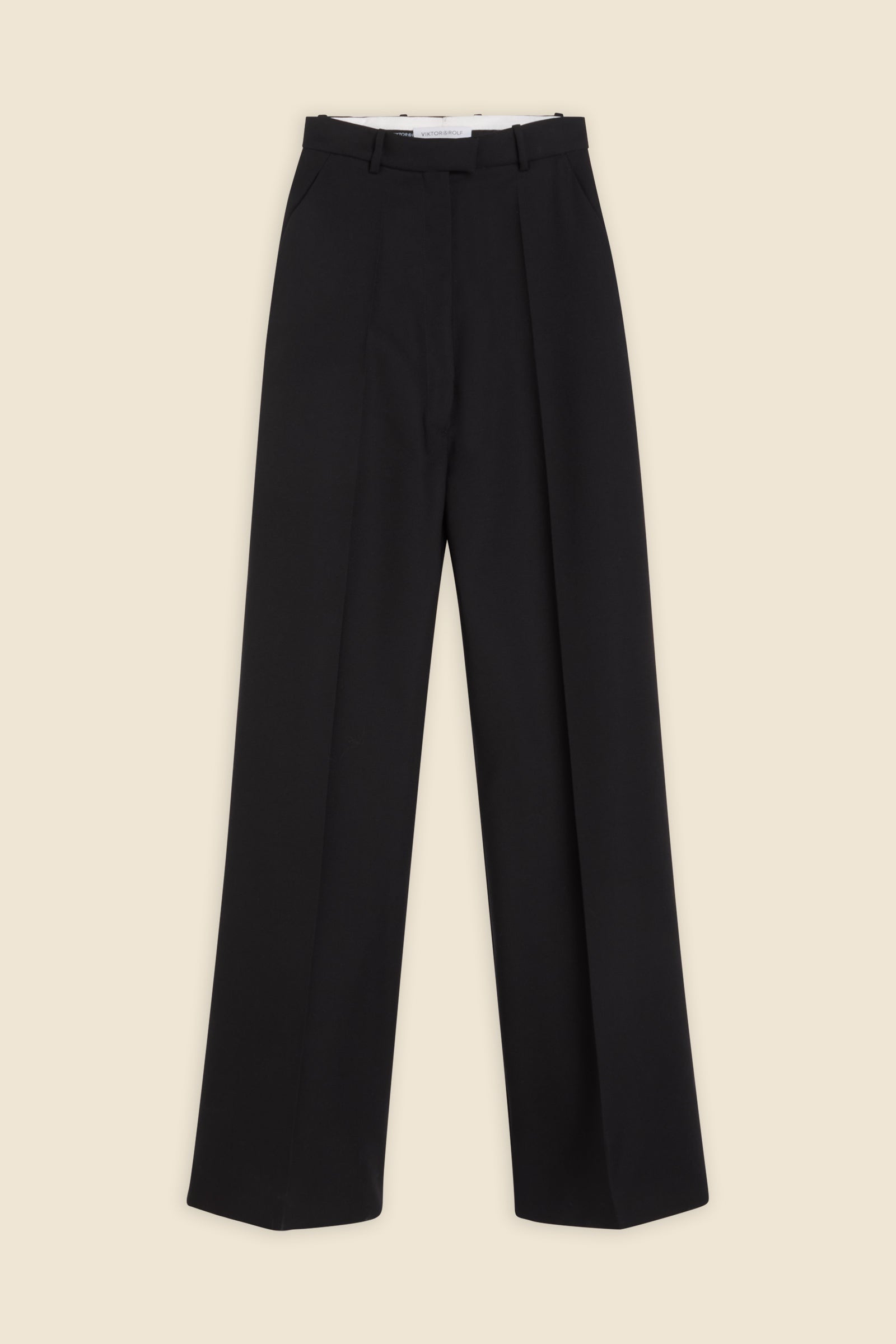 Crafted from wool, the super high waisted trousers offers a tailored fit and timeless elegance with a boning detail on the waist
