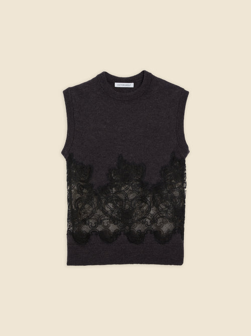 Sleeveless dark gray knit top with intricate black lace overlay, featuring a high neckline and refined craftsmanship.