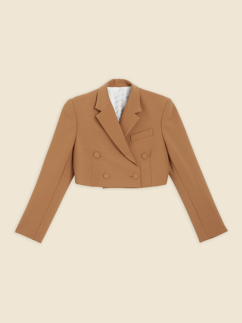 Cropped camel double-breasted blazer with notched lapels and structured shoulders, crafted from fine wool blend fabric.