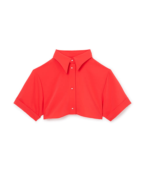Bright red cropped shirt with sharp collar and short sleeves, featuring a front button closure for a sleek, modern style.