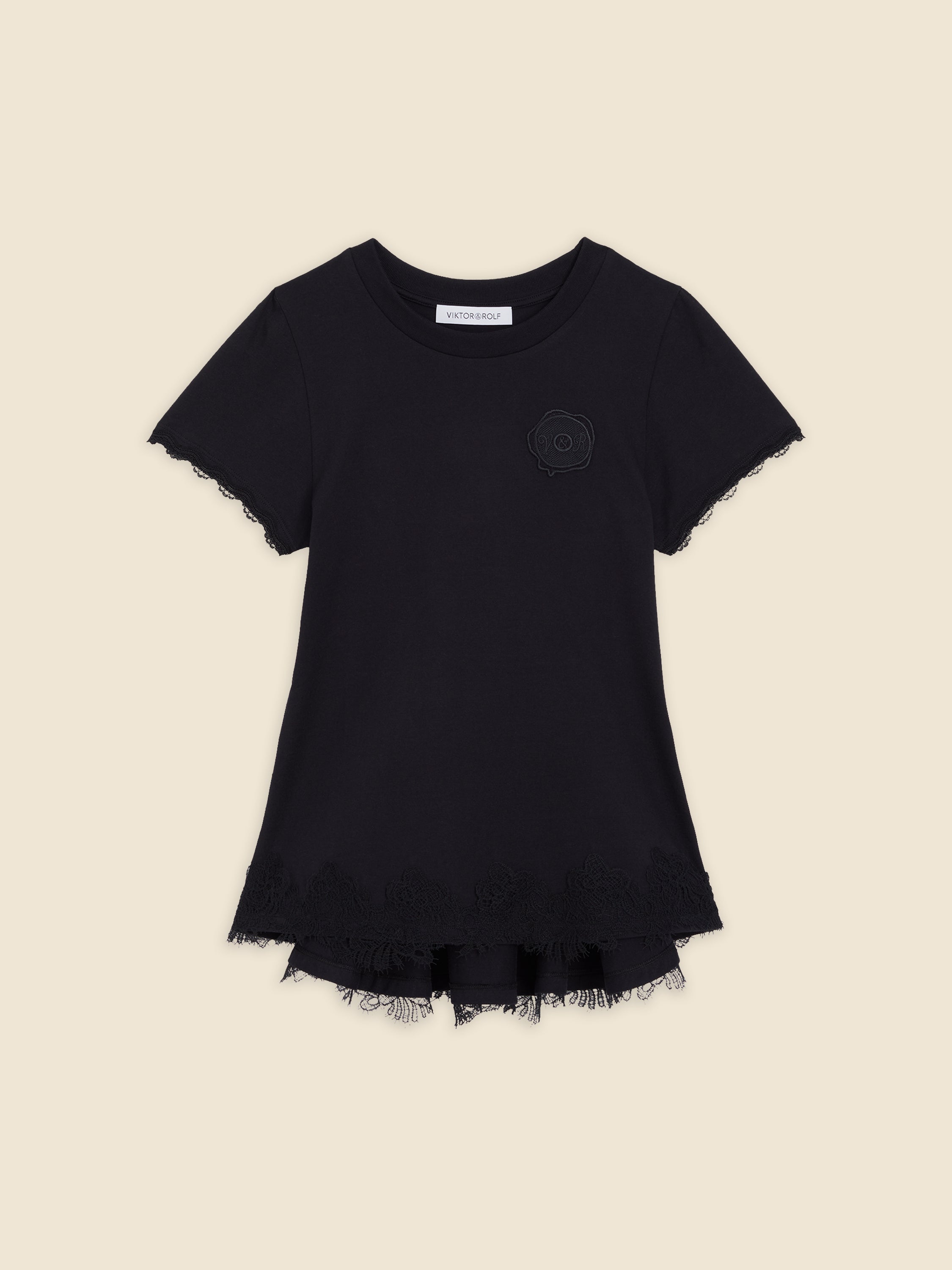 Black t-shirt featuring intricate lace trim and subtle embroidered logo, combining elegance with casual style.