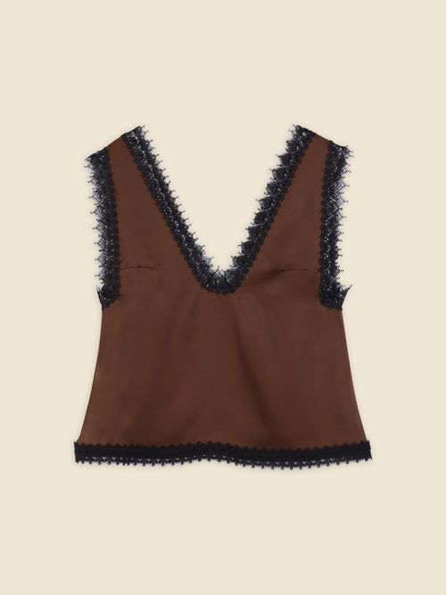 Brown sleeveless top with intricate black lace trim along deep V-neck and hem, showcasing a stylish, elegant design.