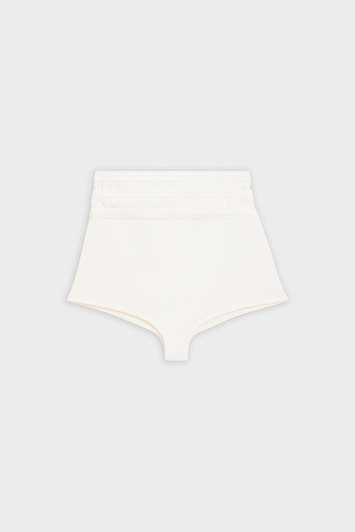 Triple layer white shorts on a white background.