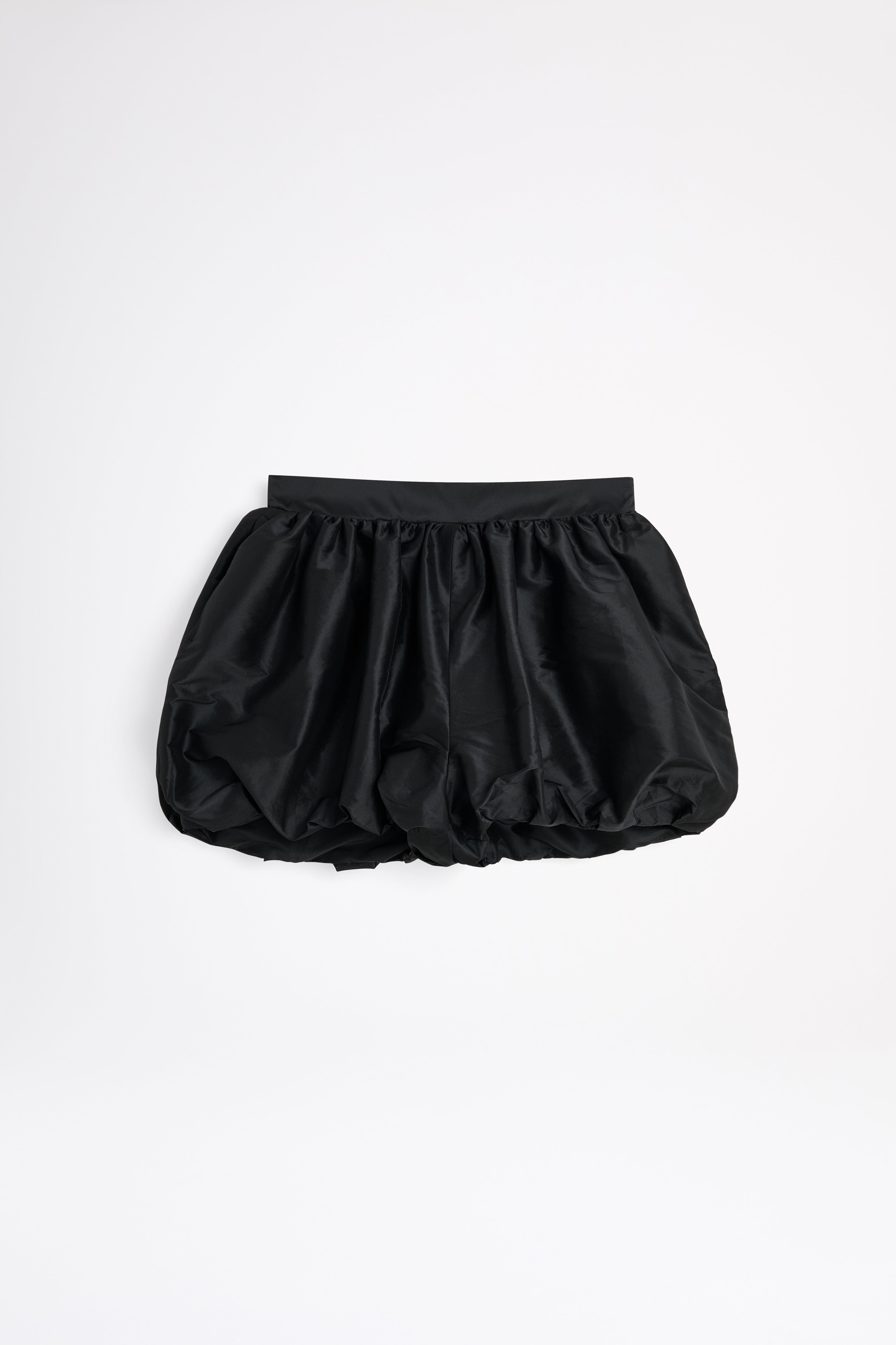Black bubble shorts on a white background