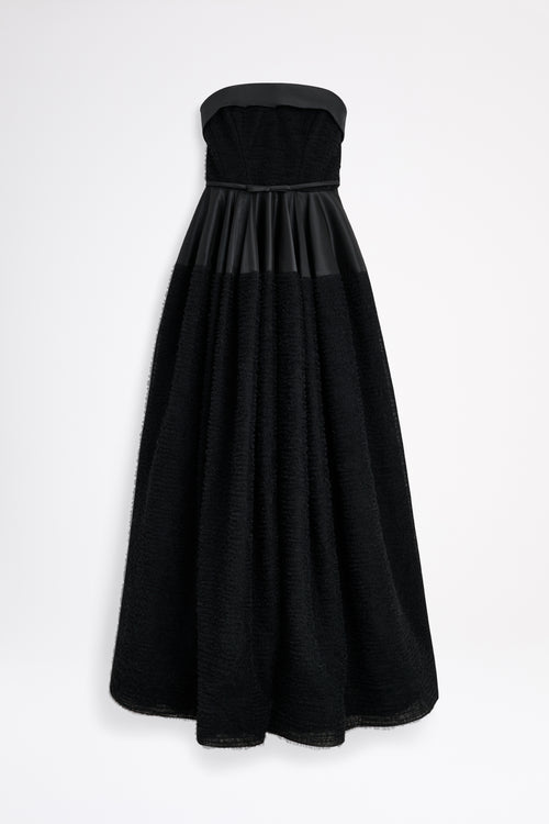 Black strapless gown on a white background