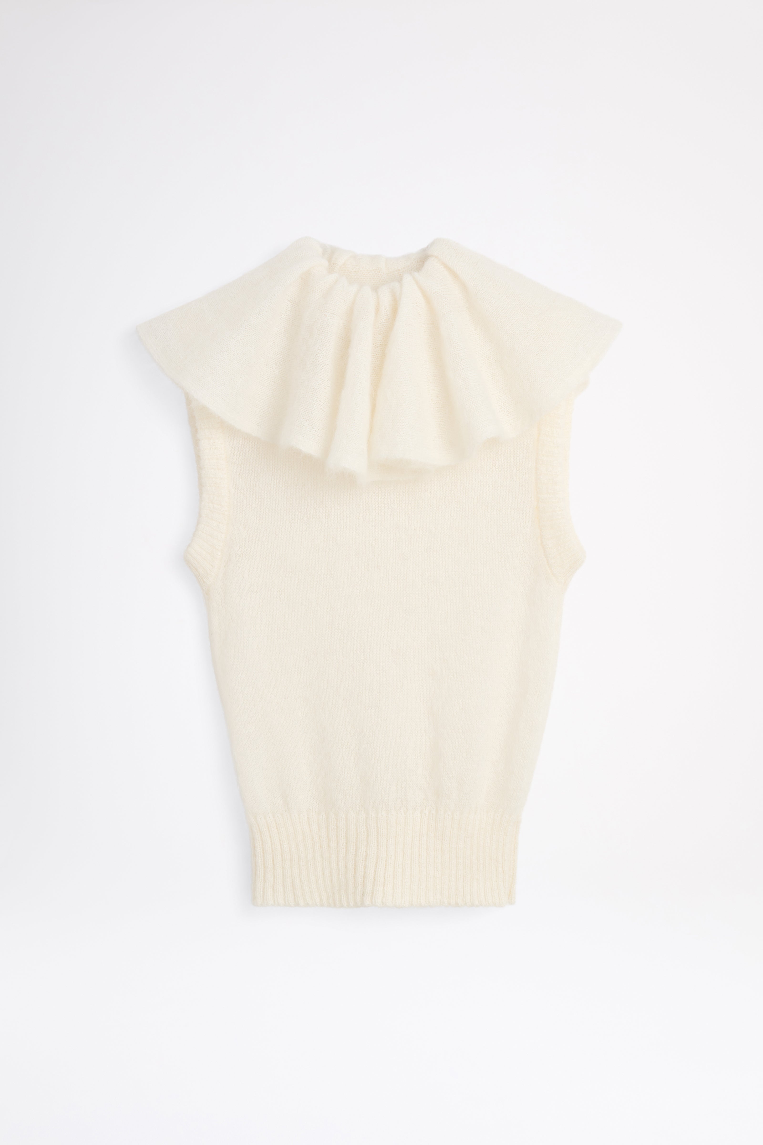 White volant neck top.