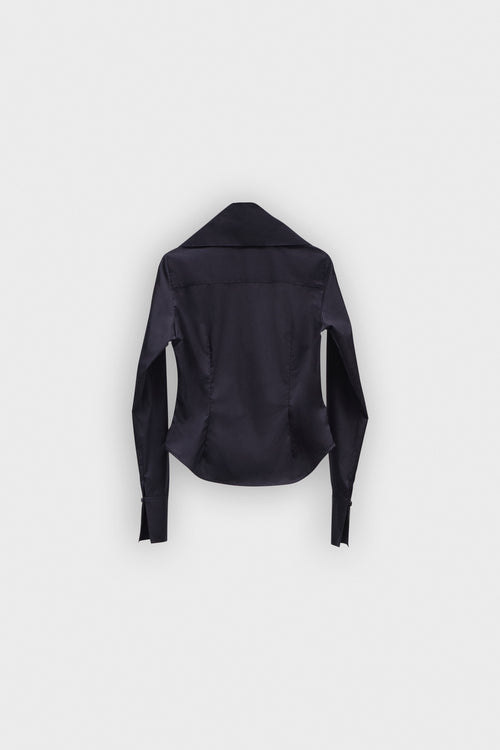 A black long sleeve shirt with a bow on the collar on a white background.