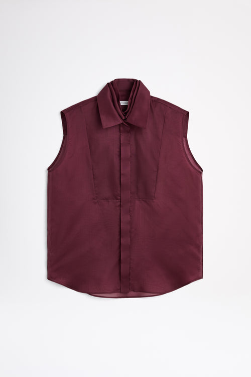 Maroon sleeveless shirt on a white background
