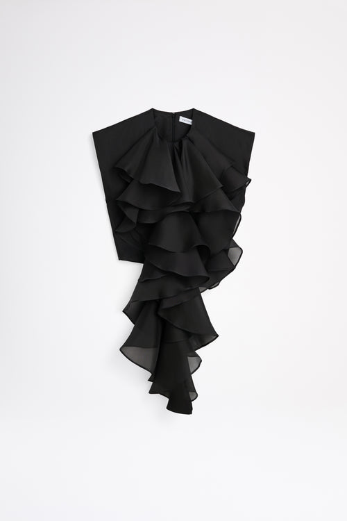 Black ruffled garment on a white background
