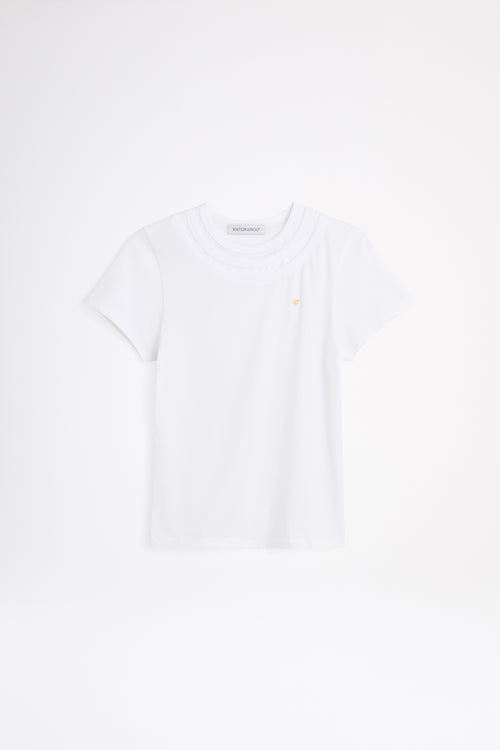 White t-shirt on a light gray background