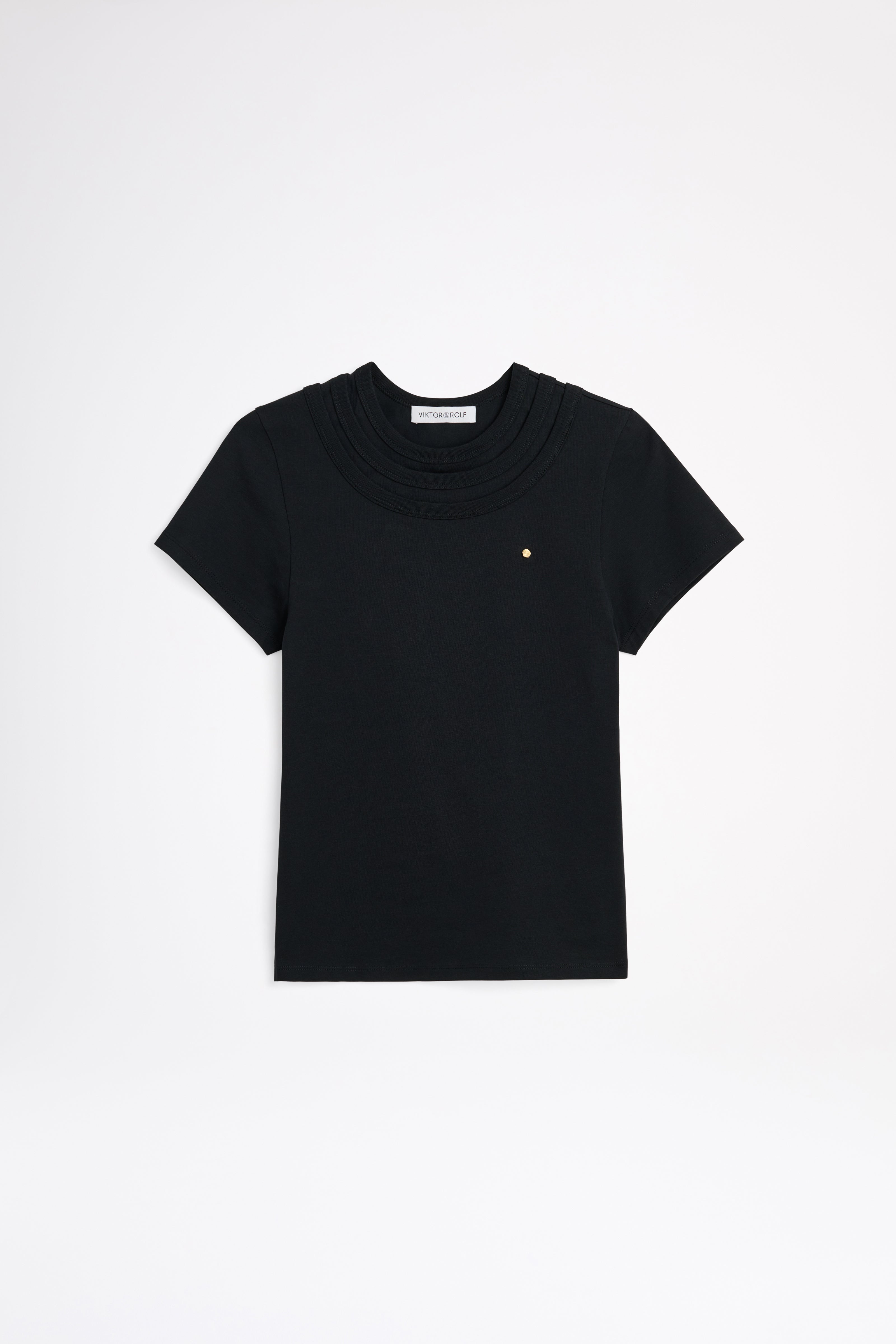 Black t-shirt with a small logo on a white background