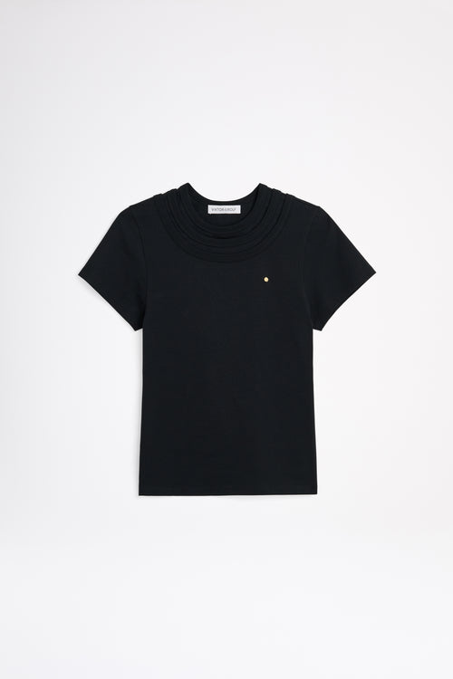 Black t-shirt with a small logo on a white background