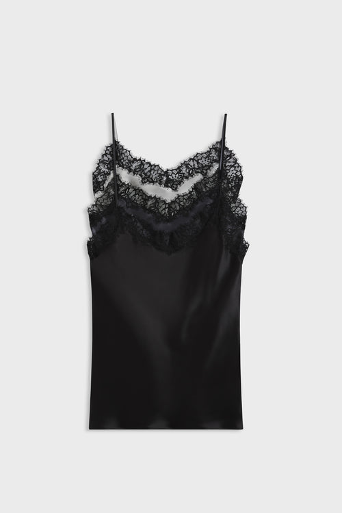 A black satin camisole slip with double layers of black lace at the neckline, displayed flat against a light gray background.