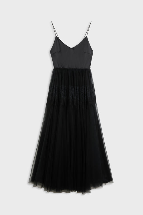 A black spaghetti-strap midi dress with a structured bodice and a layered, tiered tulle skirt, shown against a light gray background.